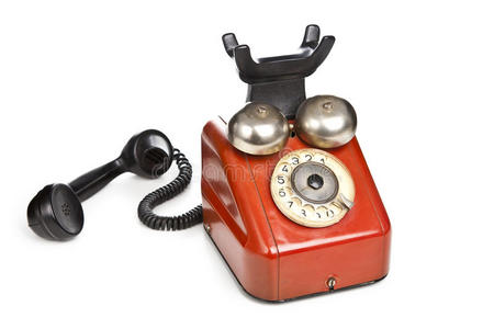 白色背景上隔离的复古红色电话