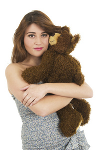 年轻女孩与玩具熊