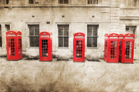 Picture of red phone boxs in London processed with a vintage te