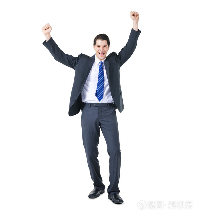 愉快的商业人双臂上举