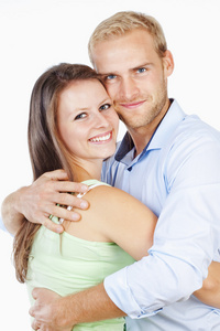 快乐对年轻夫妇带着笑容的肖像