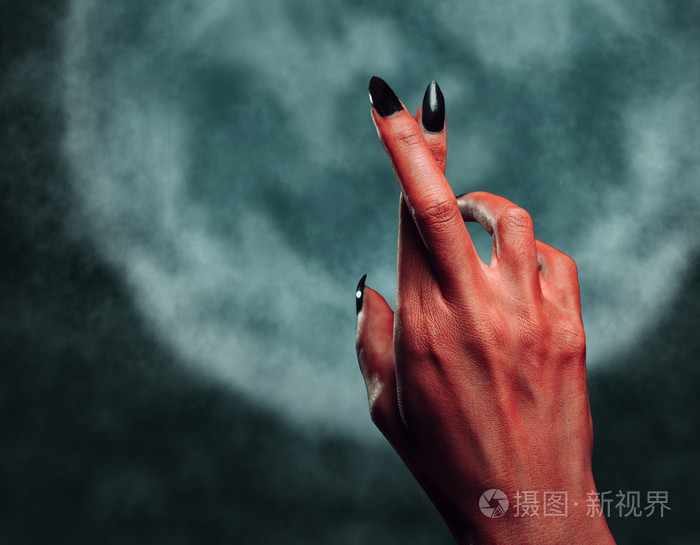 魔鬼用手势手的手指交叉在午夜照片-正版商用图片1gsfmg-摄图新视界