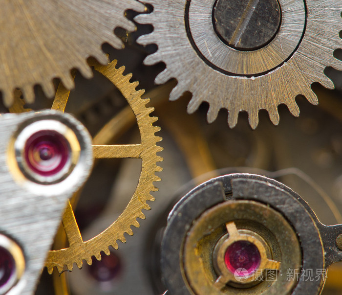 背景与金属齿轮发条概念照片