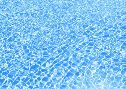 蓝色泳池起水波纹照片