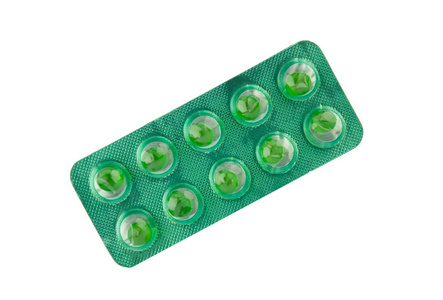 绿色软胶囊吸塑片中的显示医学概念