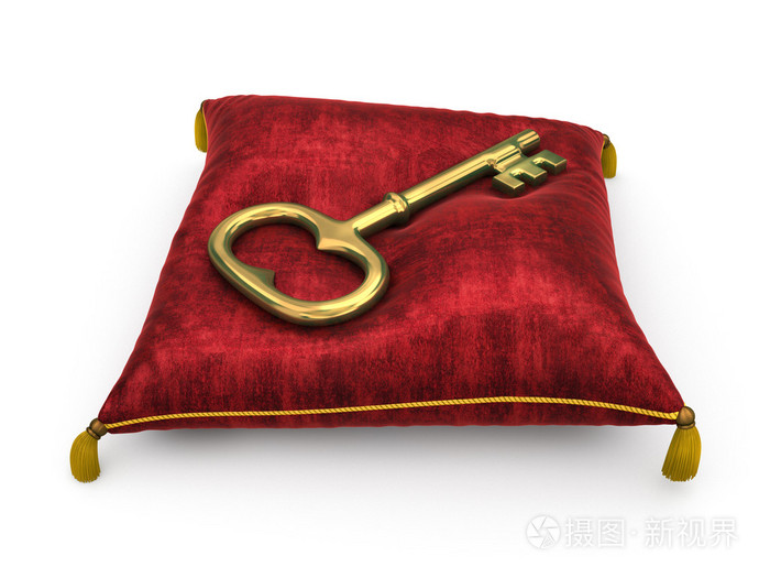 在皇家的红丝绒枕头上白色酒泉孤立的金钥匙