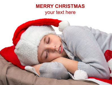 可爱的小女孩睡在圣诞老人帽