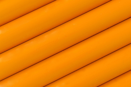 橙色塑料管材图案纹理背景