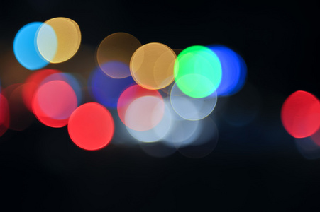 散焦的圆形光斑散焦的圆形光斑镜头光斑散焦模糊光线呈深蓝色抽象炫彩