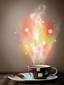 咖啡杯抽象蒸汽与炫彩灯图片