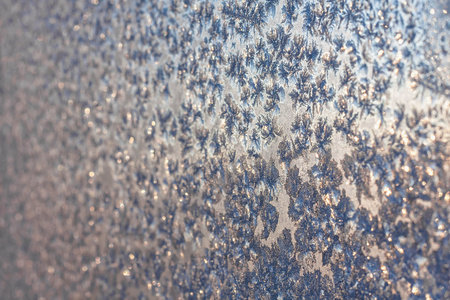 弗罗斯特和冻结窗口上的雪花