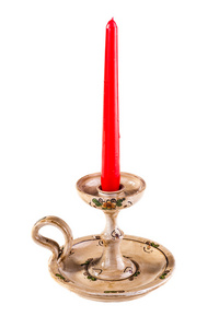 复古古董烛台用红烛孤立在一个白色的背景