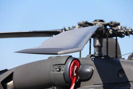 直升机的镜头直升机旋翼桨叶的特写镜头照片