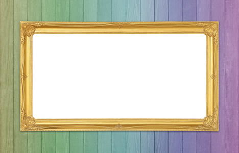 多彩的木墙背景上的金框