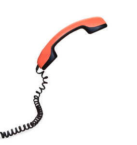 复古橙色电话听筒分离在白色的背景