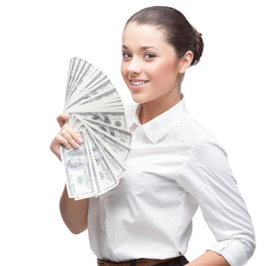 钱微笑面带微笑的年轻女商人拿着钱照片