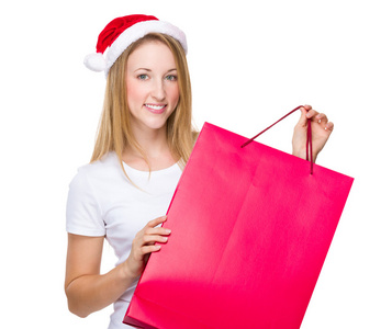 圣诞女人提着购物袋