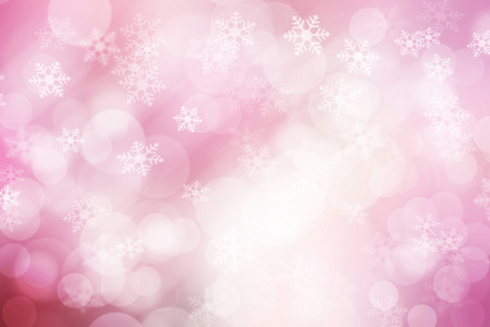 抽象的散景和雪雪花背景，粉红色和白色