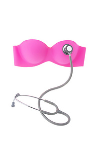 乳房癌概念 粉红色的胸罩和听诊器