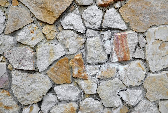 明亮的石墙马赛克纹理的背景