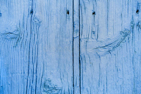 古老的木制破旧别致的蓝色背景。