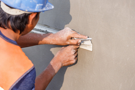 在房屋建筑的墙体抹灰混凝土工