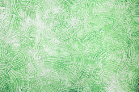 在墙上背景装饰绿色石膏纹理