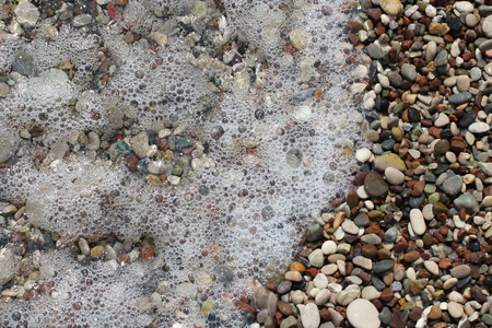 鹅卵石圆海石头与抽象背景