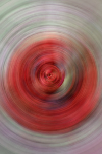 旋转圆径向运动模糊的红色抽象背景