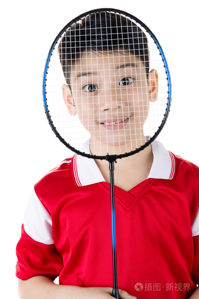 亚洲男孩在羽毛球行动