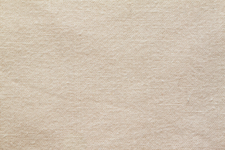 背景的米色麻布面料照片