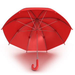 雨下了一把红伞美丽的新娘和新郎在公园的雨伞下散步