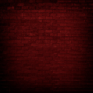 红砖墙与昏暗的灯光下为背景图片