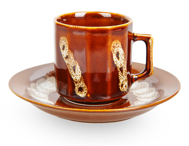 棕色陶瓷茶杯和茶碟