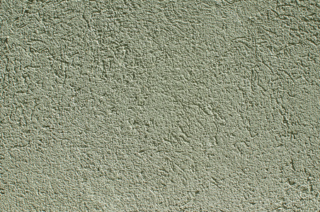 绿色的彩色的石膏房子墙
