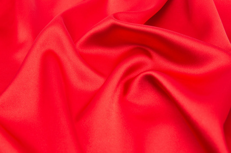 红色的绸缎或丝带面料作为背景