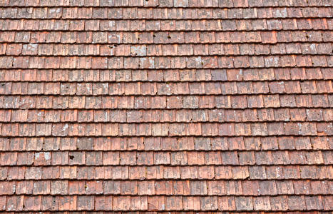 旧红色屋顶瓷砖背景