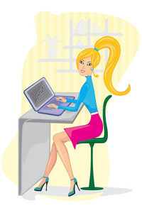 一个年轻的女人在用她的笔记本电脑工作