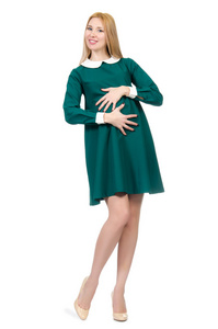 美丽孕妇穿着绿色上白色孤立