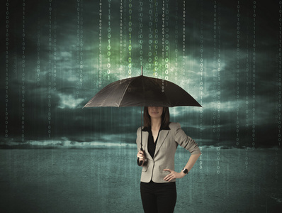 女商人站在伞数据保护的概念
