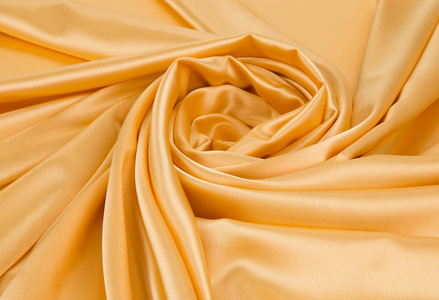 黄色布料金黄色的丝绸布料纹理照片