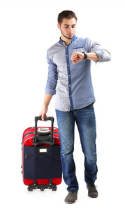 男人穿着蓝色衬衫和牛仔裤配上白色孤立的手提箱