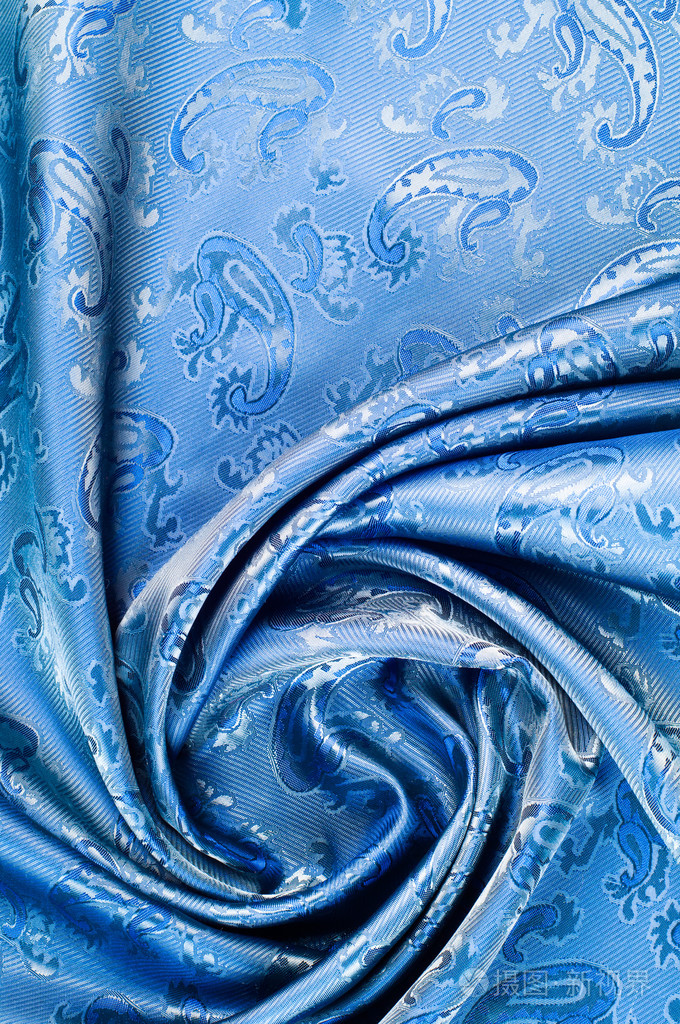 丝绸织物的质地深蓝色有黄瓜的照片蚕在制造蚕茧过程中产生的一种优良