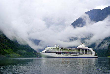 Tourism vacation and travel. Mountains and fjord Nryfjord in G