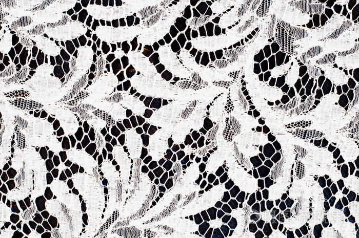 纹理蕾丝面料在白色背景工作室上花边