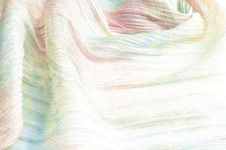 褶皱织物与彩色抽象图纸。 全框带褶皱织物与休闲嬉皮士一样的图案