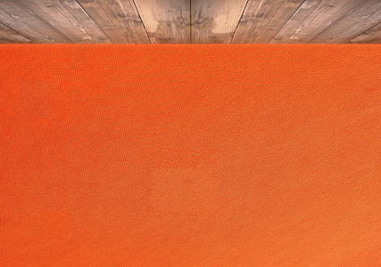 与木地板的抽象橙色墙