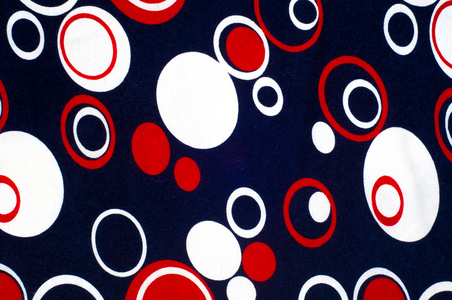 织物的纹理用蓝色圆圈编织，红色白色