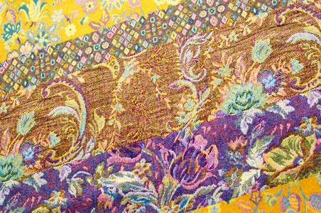 织锦织物的质地。 画着一种花的图案
