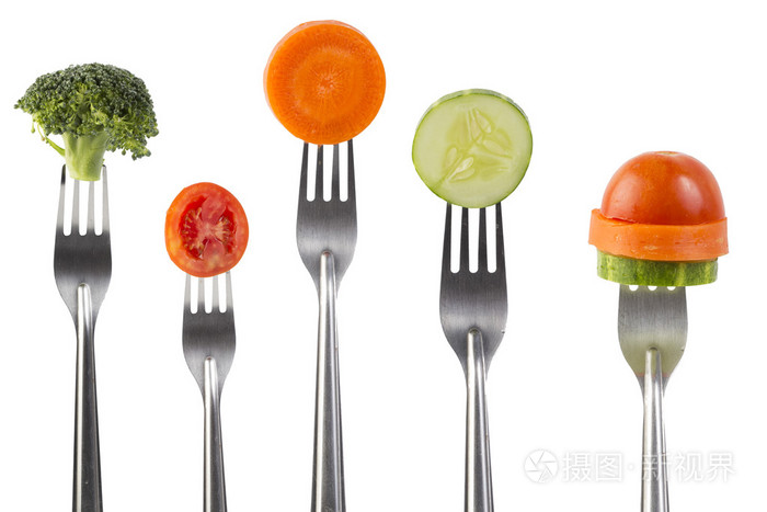 蔬菜上的叉子，饮食概念的集合